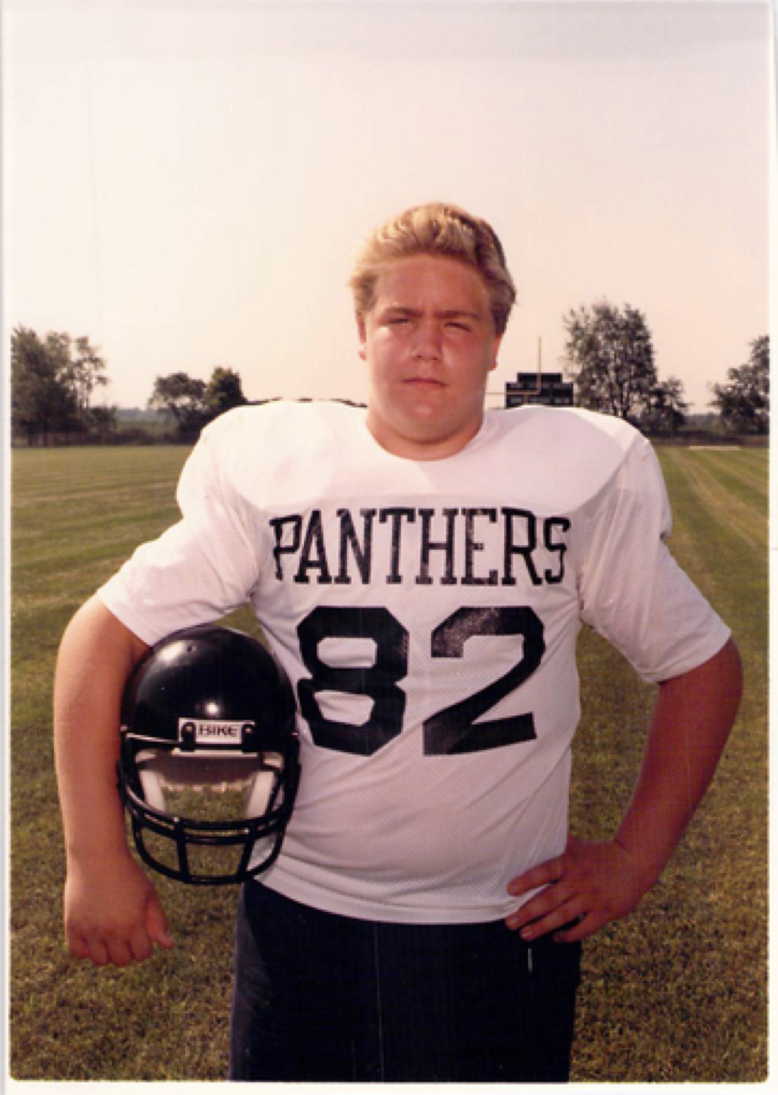 Dom in his Glenbard North Panthers football uniform